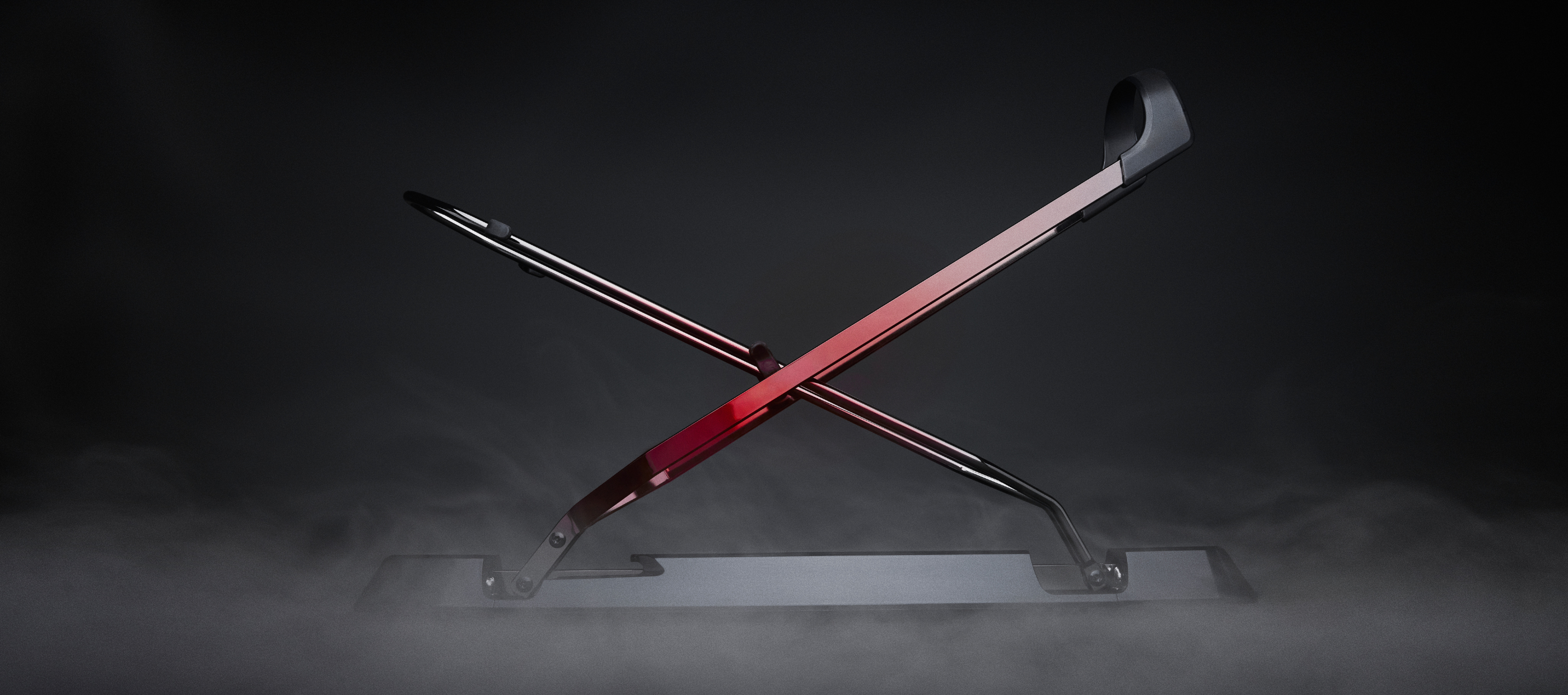 A side shot of the ProFlex Rack with the rack arms opened half way with smoke.