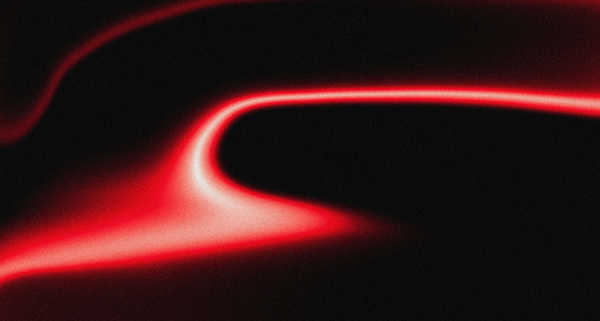 Red abstract light design on a black background